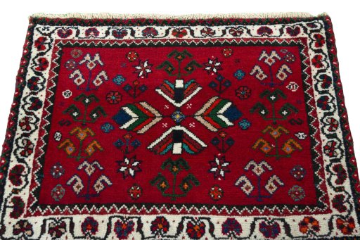 Surface texture of 2000s Shiraz rug with natural Wool and intricate pattern