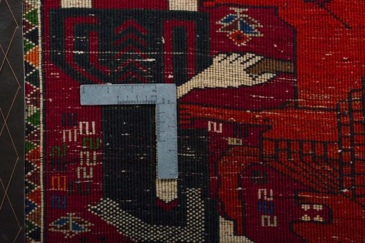 Backside of handmade 2000s Shiraz rug showing knot structure and weave density