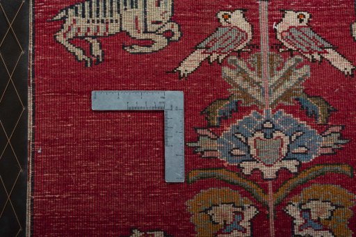 Backside of handmade 2000s Shiraz rug showing knot structure and weave density