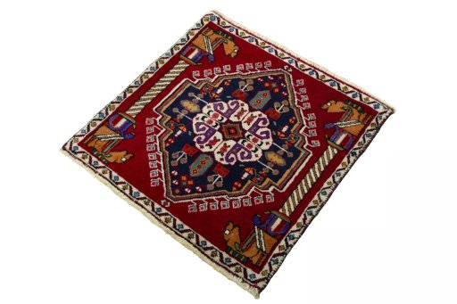 Corner detail of 2000s Shiraz rug showing border pattern and Wool pile