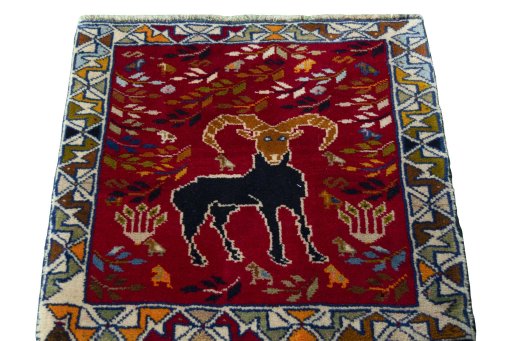 Surface texture of 2000s Shiraz rug with natural Wool and intricate pattern