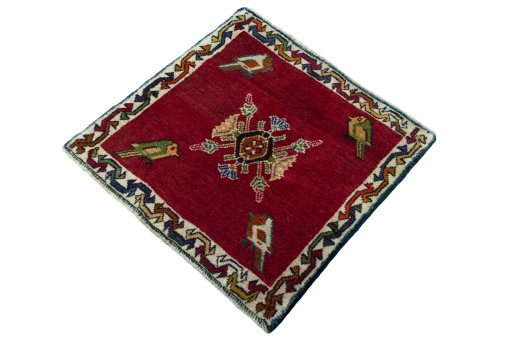 Corner detail of 2000s Shiraz rug showing border pattern and Wool pile
