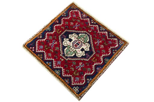 Corner detail of 2000s Shiraz rug showing border pattern and Wool pile