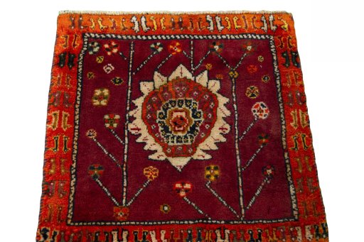 Surface texture of 2000s Shiraz rug with natural Wool and intricate pattern