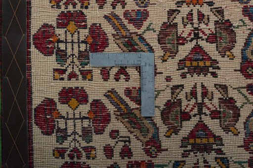 Backside of handmade 2000s Shiraz rug showing knot structure and weave density