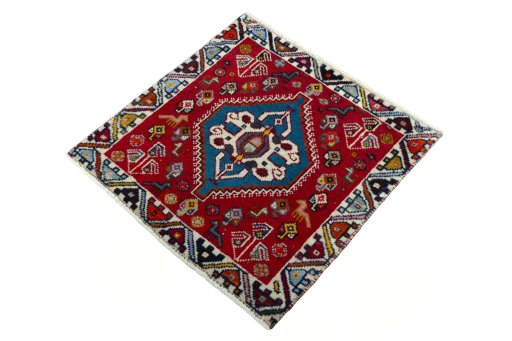 Corner detail of 2000s Shiraz rug showing border pattern and Wool pile