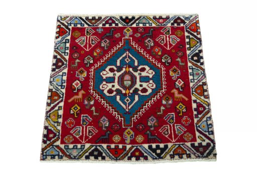 Surface texture of 2000s Shiraz rug with natural Wool and intricate pattern