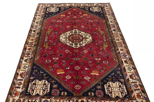 Surface texture of 1970s Shiraz rug with natural Wool and intricate pattern