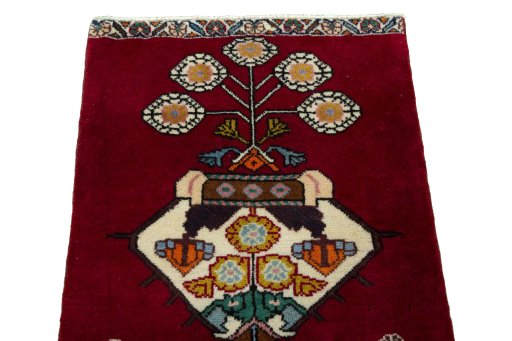 Surface texture of 2000s Shiraz rug with natural Wool and intricate pattern