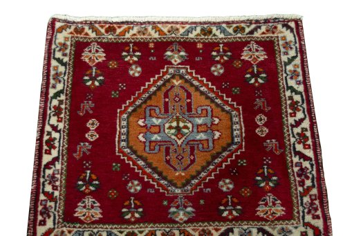 Surface texture of 2000s Shiraz rug with natural Wool and intricate pattern