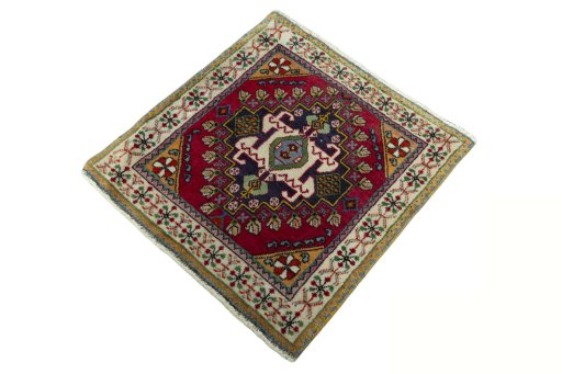 Corner detail of 2000s Shiraz rug showing border pattern and Wool pile