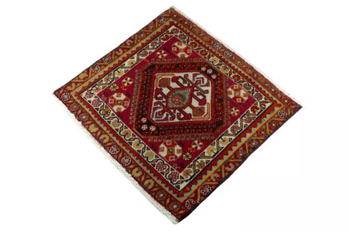 Corner detail of 2000s Shiraz rug showing border pattern and Wool pile