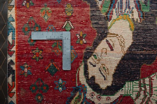 Backside of handmade 2000s Shiraz rug showing knot structure and weave density