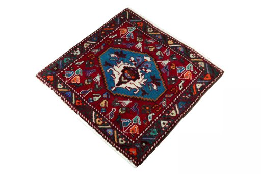 Corner detail of 2000s Shiraz rug showing border pattern and Wool pile