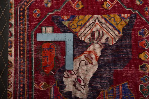 Backside of handmade 2000s Shiraz rug showing knot structure and weave density