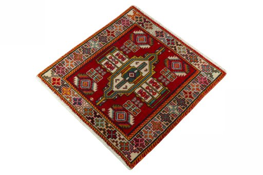 Corner detail of 2000s Shiraz rug showing border pattern and Wool pile