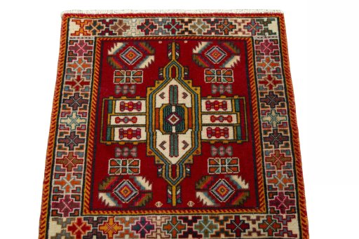 Surface texture of 2000s Shiraz rug with natural Wool and intricate pattern