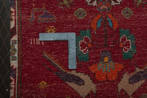 Backside of handmade 2000s Shiraz rug showing knot structure and weave density