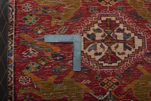 Backside of handmade 2000s Shiraz rug showing knot structure and weave density