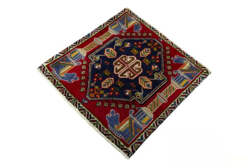 Corner detail of 2000s Shiraz rug showing border pattern and Wool pile
