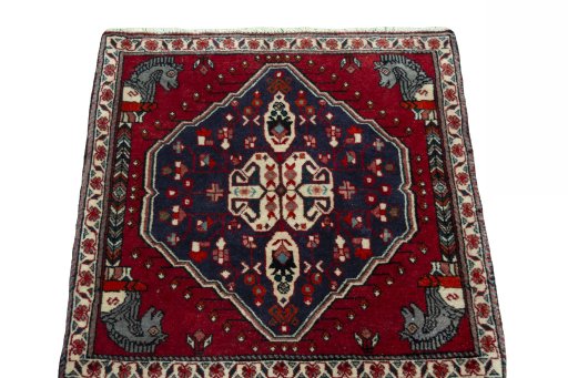 Surface texture of 2000s Shiraz rug with natural Wool and intricate pattern