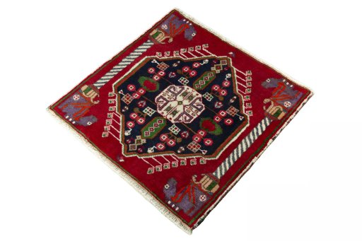 Corner detail of 2000s Shiraz rug showing border pattern and Wool pile