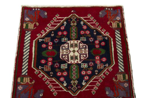 Surface texture of 2000s Shiraz rug with natural Wool and intricate pattern