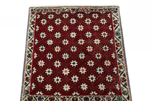 Surface texture of 2000s Shiraz rug with natural Wool and intricate pattern