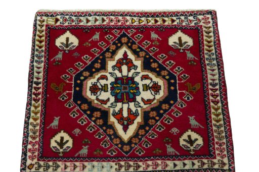 Surface texture of 2000s Shiraz rug with natural Wool and intricate pattern