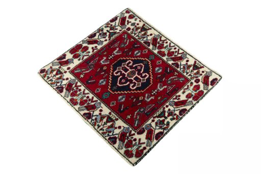 Corner detail of 2000s Shiraz rug showing border pattern and Wool pile