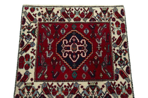 Surface texture of 2000s Shiraz rug with natural Wool and intricate pattern
