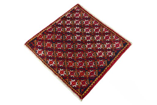 Corner detail of 2000s Shiraz rug showing border pattern and Wool pile