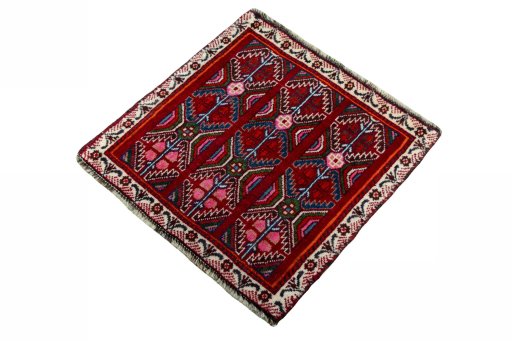 Corner detail of 2000s Shiraz rug showing border pattern and Wool pile