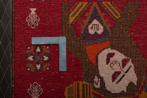 Backside of handmade 2000s Shiraz rug showing knot structure and weave density