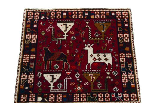 Surface texture of 2000s Shiraz rug with natural Wool and intricate pattern