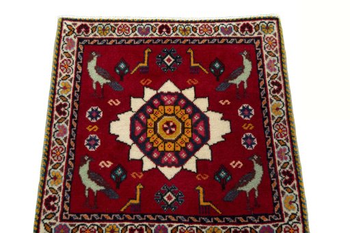 Surface texture of 2000s Shiraz rug with natural Wool and intricate pattern
