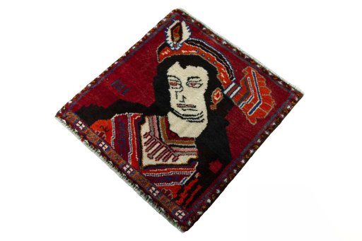 Corner detail of 2000s Shiraz rug showing border pattern and Wool pile