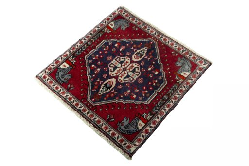 Corner detail of 2000s Shiraz rug showing border pattern and Wool pile