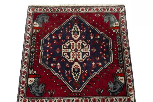 Surface texture of 2000s Shiraz rug with natural Wool and intricate pattern