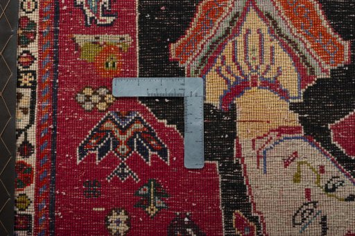 Backside of handmade 2000s Shiraz rug showing knot structure and weave density
