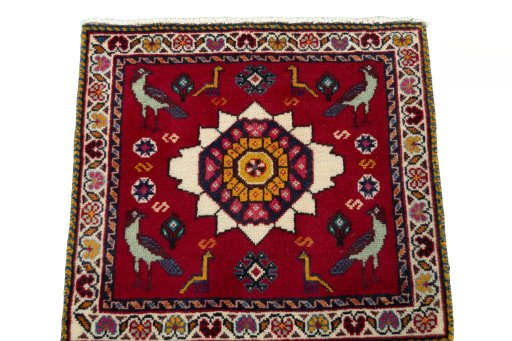 Surface texture of 2000s Shiraz rug with natural Wool and intricate pattern