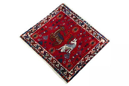 Corner detail of 2000s Shiraz rug showing border pattern and Wool pile