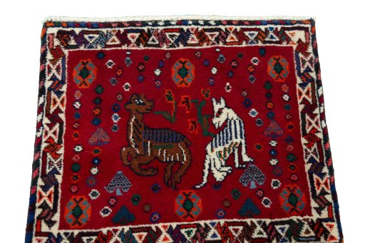 Surface texture of 2000s Shiraz rug with natural Wool and intricate pattern
