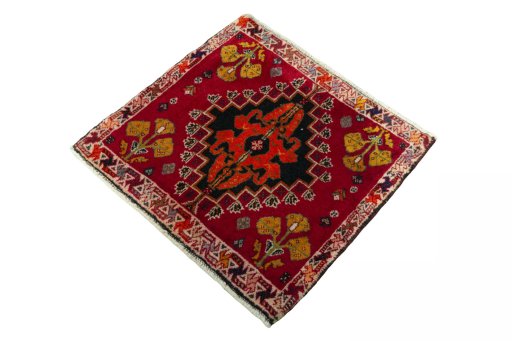 Corner detail of 2000s Shiraz rug showing border pattern and Wool pile