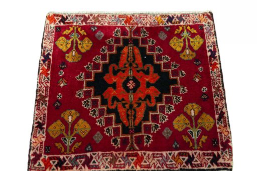 Surface texture of 2000s Shiraz rug with natural Wool and intricate pattern