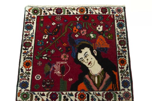 Surface texture of 2000s Shiraz rug with natural Wool and intricate pattern