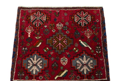 Surface texture of 2000s Shiraz rug with natural Wool and intricate pattern