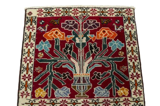 Surface texture of 2000s Shiraz rug with natural Wool and intricate pattern