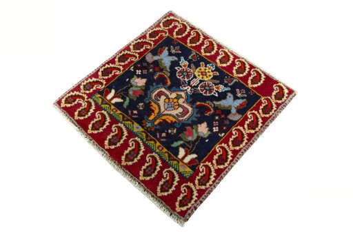 Corner detail of 2000s Shiraz rug showing border pattern and Wool pile