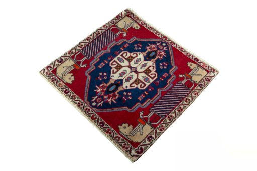 Corner detail of 2000s Shiraz rug showing border pattern and Wool pile